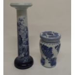 A blue and white ceramic plant pedestal and an Oriental blue and white ceramic garden seat (2)