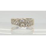 An 18ct gold diamond dress ring set with estimated approx 0.35cts of brilliant cut diamonds,