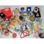 A collection of costume jewellery to include, a Butler & Wilson pig brooch, an owl bangle and