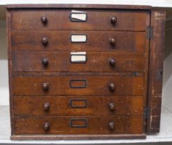 A late Victorian six drawer countertop  specimen chest with Wellington style locking board, 59cm