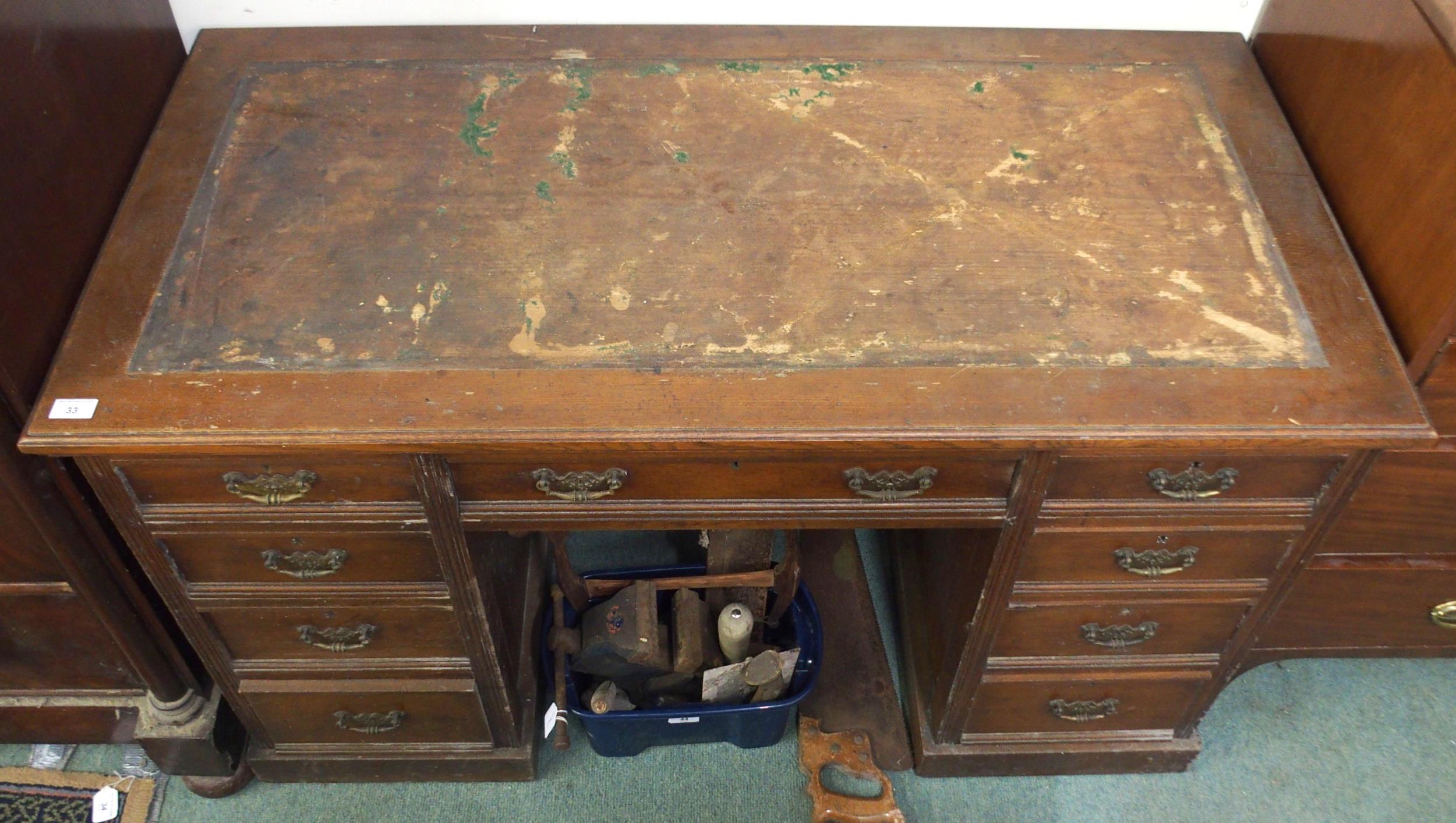 A Victorian oak twin pedestal desk with central drawer containing writing slope flanked by four - Image 4 of 4