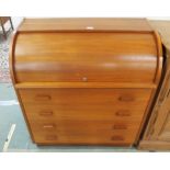 A mid 20th century teak cylinder top writing bureau, 99cm high x 90cm wide x 47cm deep Condition