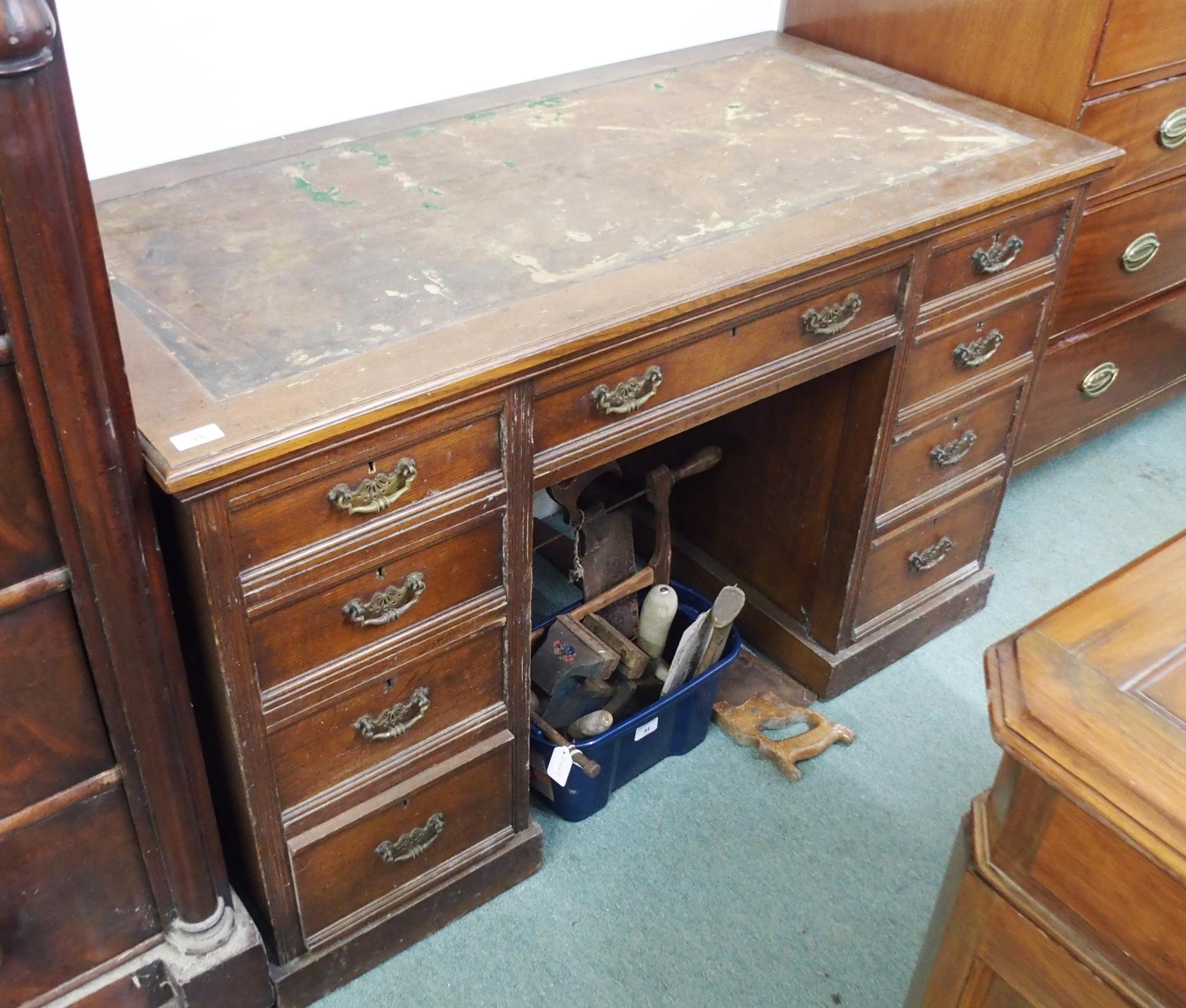 A Victorian oak twin pedestal desk with central drawer containing writing slope flanked by four - Image 2 of 4