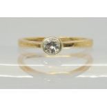 A 9ct gold diamond solitaire ring set with an estimated approx 0.25cts brilliant cut diamond, finger