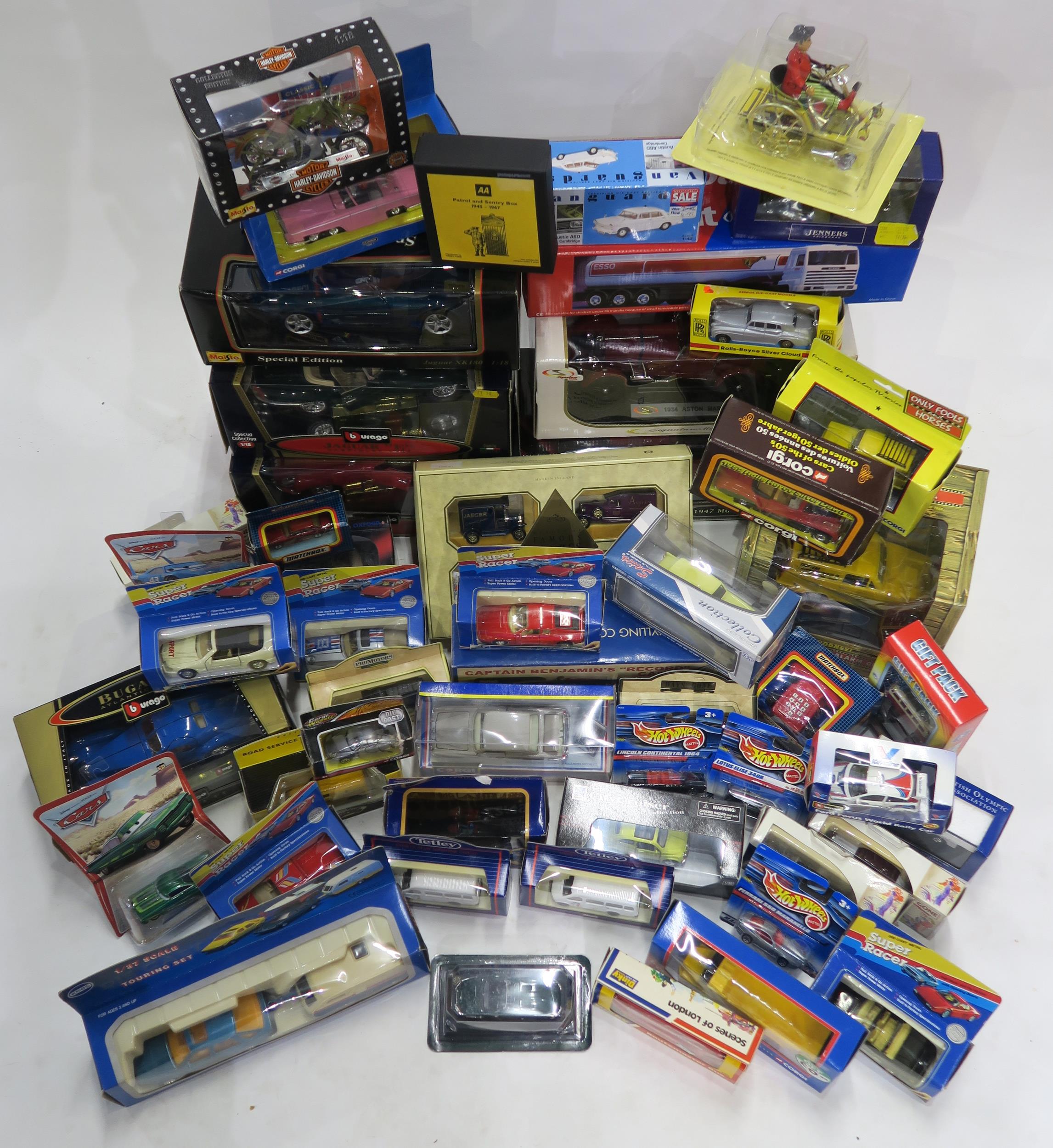 A large quantity of boxed scale model and toy vehicles, to include Burago, Corgi, Dinky and Hot