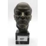 A hollow bronzed bust of Vladimir Lenin, on black marble base, approx. 16cm high Condition Report: