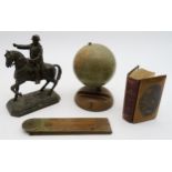 A spelter equestrian statue (possibly Napoleon); Mauchline ware New Testament depicting the