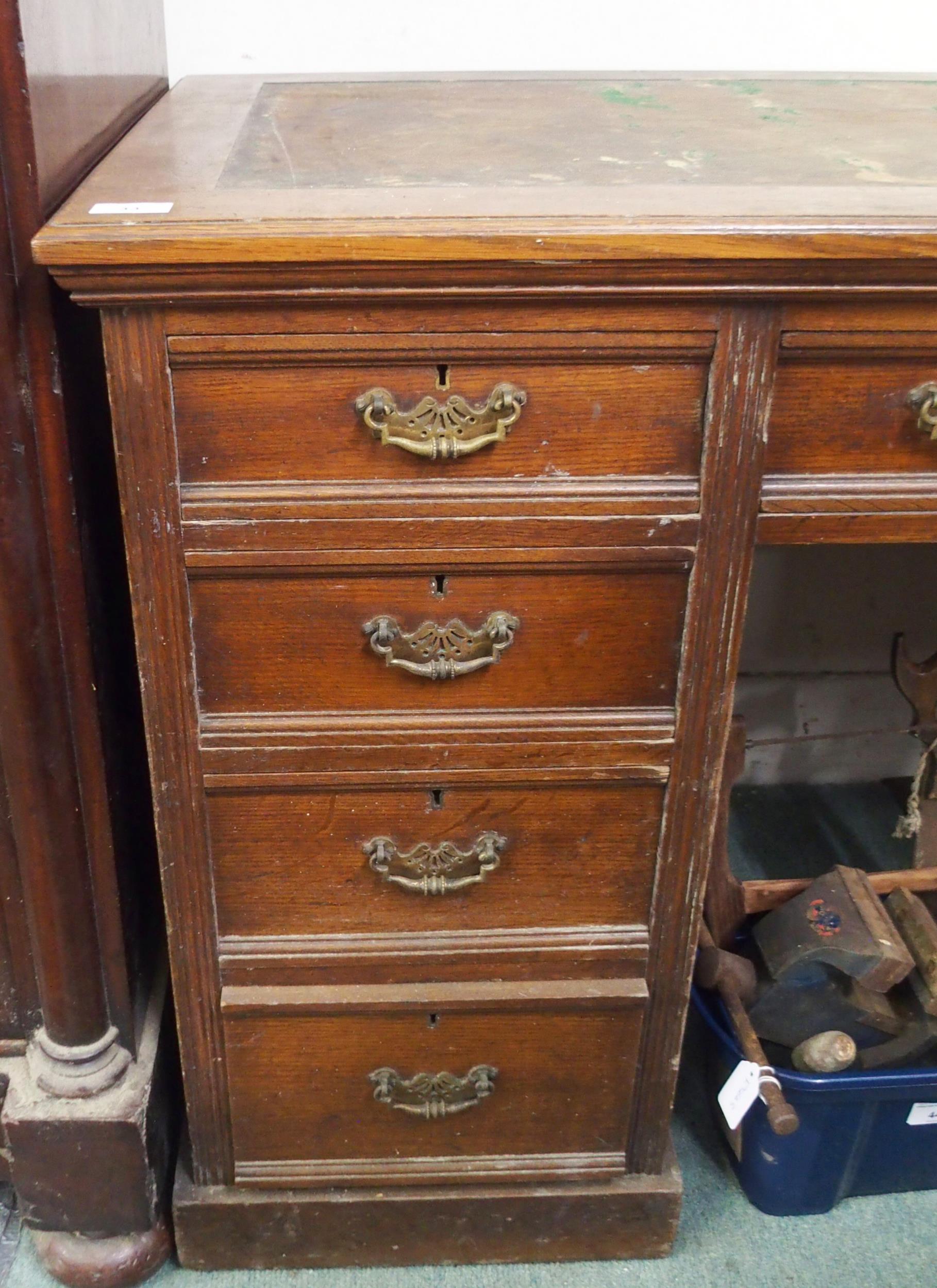 A Victorian oak twin pedestal desk with central drawer containing writing slope flanked by four - Image 3 of 4