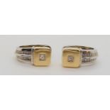 A pair of 14k gold and diamond statement earrings, set with estimated approx two princess cut