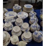 An extensive Royal Worcester Blue Dragon pattern dinner service, comprising plates, bowls, oval