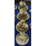 A continental tea set, the green ground with coral coloured flowers Condition Report:Available