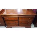 A 20th century mahogany bank of eight drawers, 90cm high x 150cm wide x 55cm deep Condition Report: