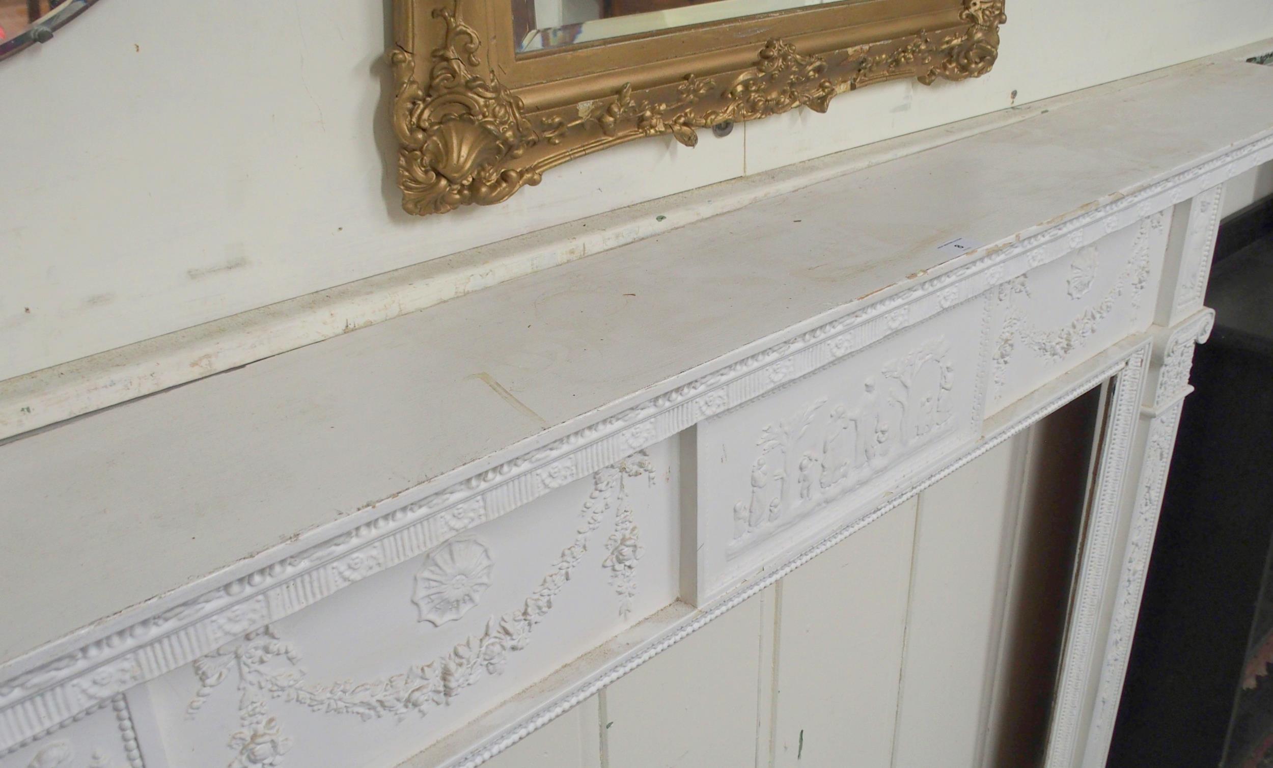 A 19th century pine and plaster whited painted fire surround with cast central relief depicting - Image 4 of 4