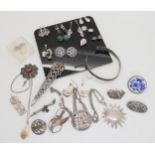 Two Shetland silver brooches, a John Hart plaid brooch, a marcasite Royal Navy sweetheart brooch etc