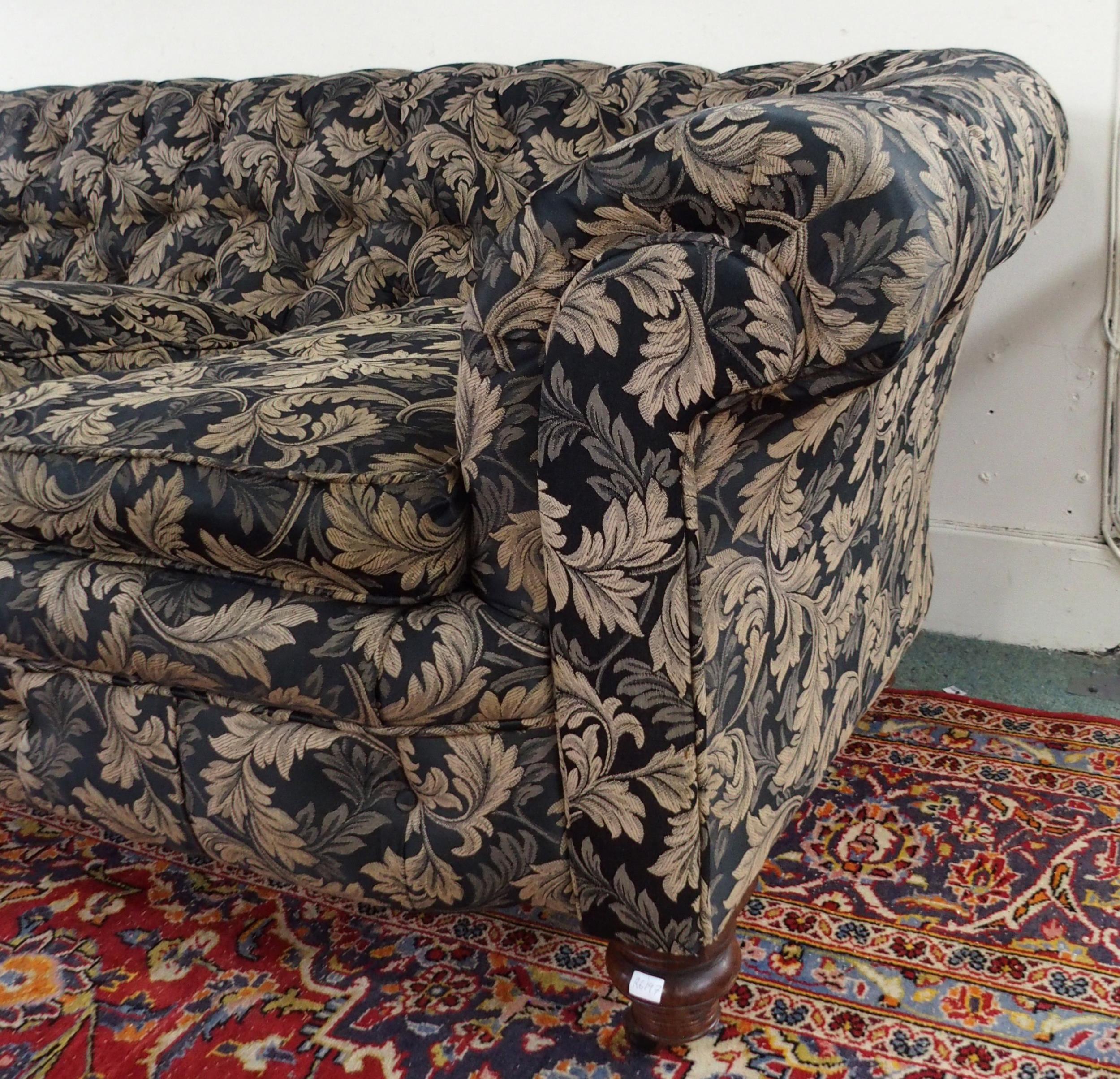 A Victorian button back three seater settee upholstered in a black and gilt acanthus leaves fabric - Image 2 of 5