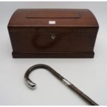 A mahogany dome-top stationary box and a silver-mounted walking cane (London marks, Henry