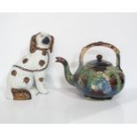 A vine and grape moulded teapot, possibly Scottish with blue, brown and green glaze, together with a
