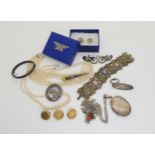 A Silver hairslide, a Robert Allison CFP monogrammed brooch, a Skean dhu brooch, a pair of