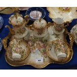 A continental porcelain coffee set on tray, decorated with pink blossom flowers, a Nautilus shell