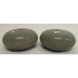 A pair of curling stones lacking handles (2) Condition Report:Available upon request