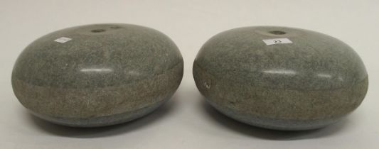 A pair of curling stones lacking handles (2) Condition Report:Available upon request