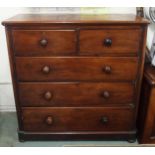 A Victorian mahogany two over three chest of drawers on bun feet, 120cm high x 120cm wide x 51cm