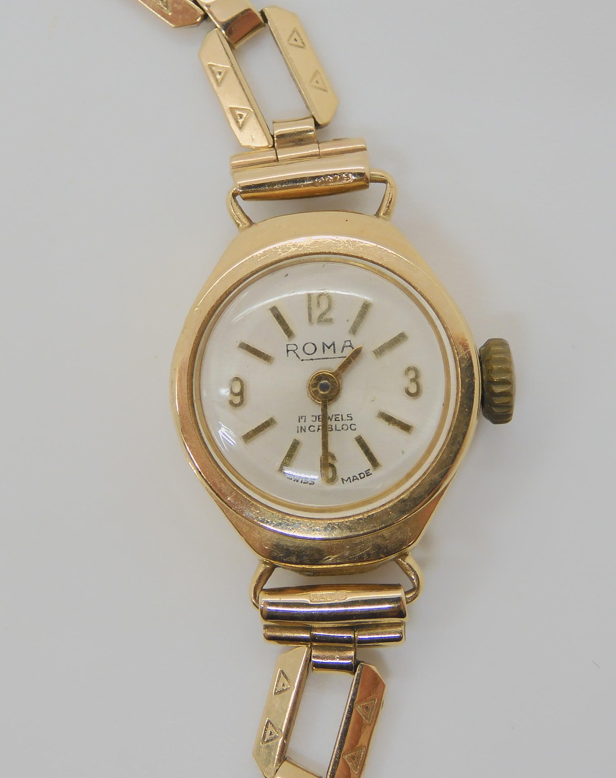 A 9ct gold ladies Roma watch and strap, weight including mechanism 12.5gms Condition Report: - Image 2 of 3