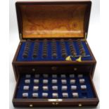 The The U.S. States Quarter Dollar Chest set with 54 state coins and 55 stacks of uncirculated coins