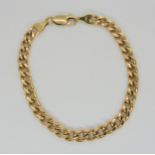 A 9ct gold curb chain bracelet, length 18.5cm, weight 5.5gms Condition Report:Available upon