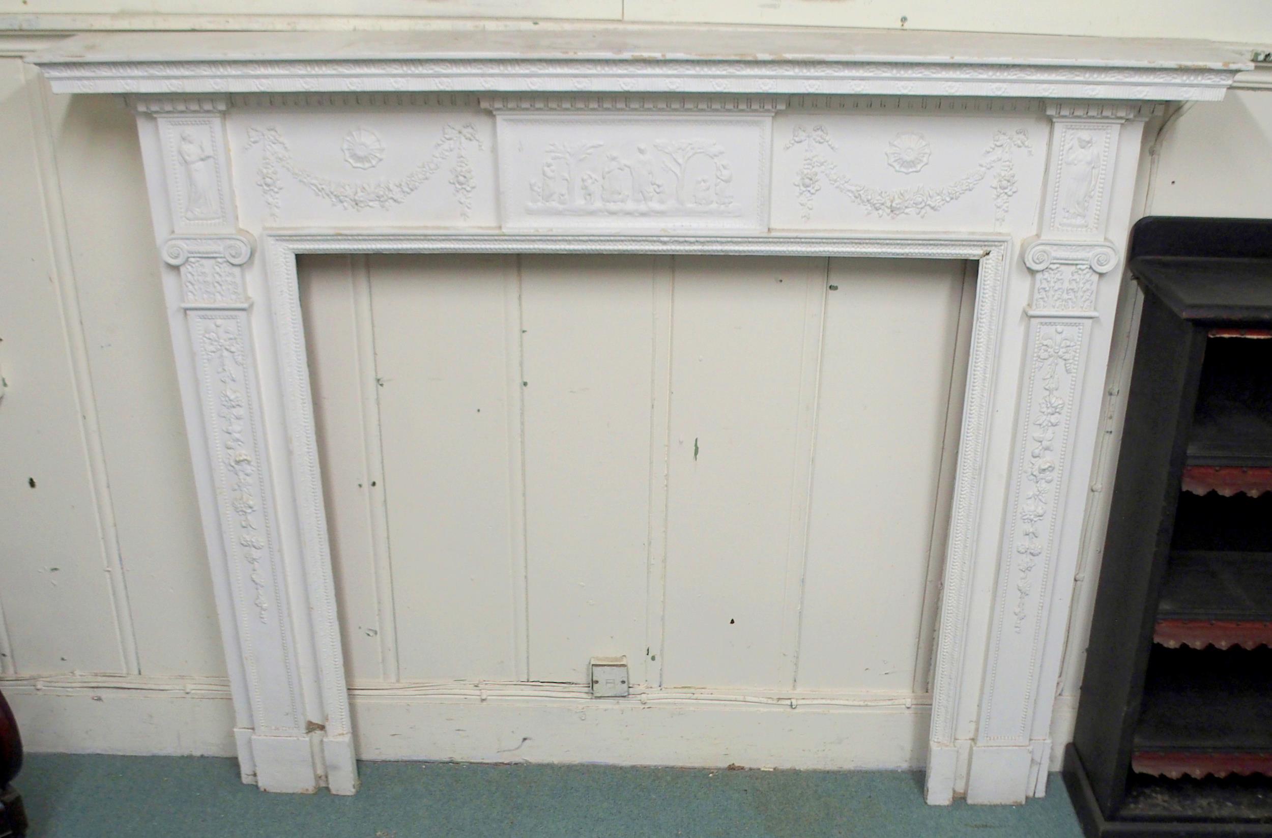 A 19th century pine and plaster whited painted fire surround with cast central relief depicting