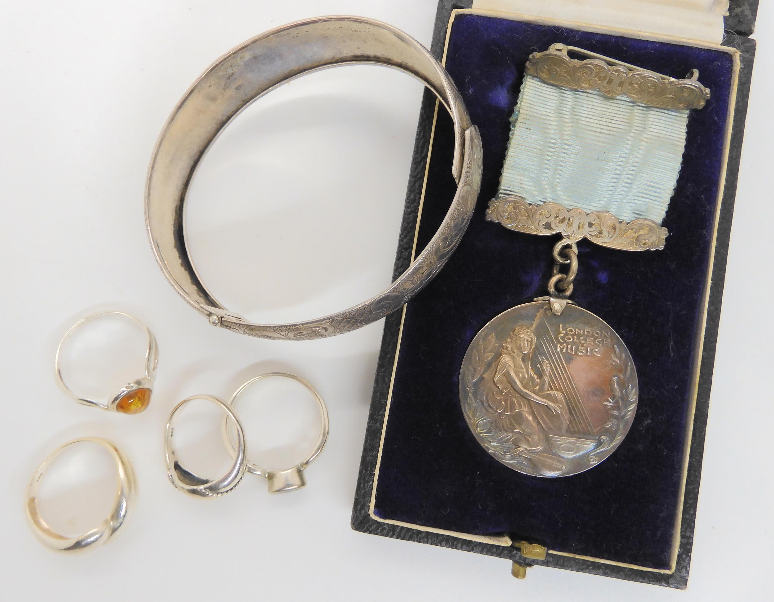 A silver The London College of Music medal, silver rings and a bangle Condition Report:Not available - Image 3 of 3