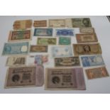 A collection of bank notes to include WW2 South East Asian examples Japanese Burma 100 rupee