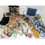 A large collection of vintage beads and costume jewellery Condition Report:Not available for this