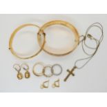 A collection of gold plated and rolled gold items to include two bangles, rings etc Condition