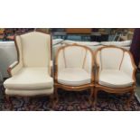 A pair of 20th century tub chairs and a 20th century wingback armchair (3) Condition Report: