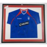 SPORTING MEMORABILIA A framed 2003-04 Glasgow Rangers home football shirt with team signatures