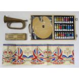 A brass and copper bugle by Premier, a case of artist's paints, a wooden games box and a "God Save