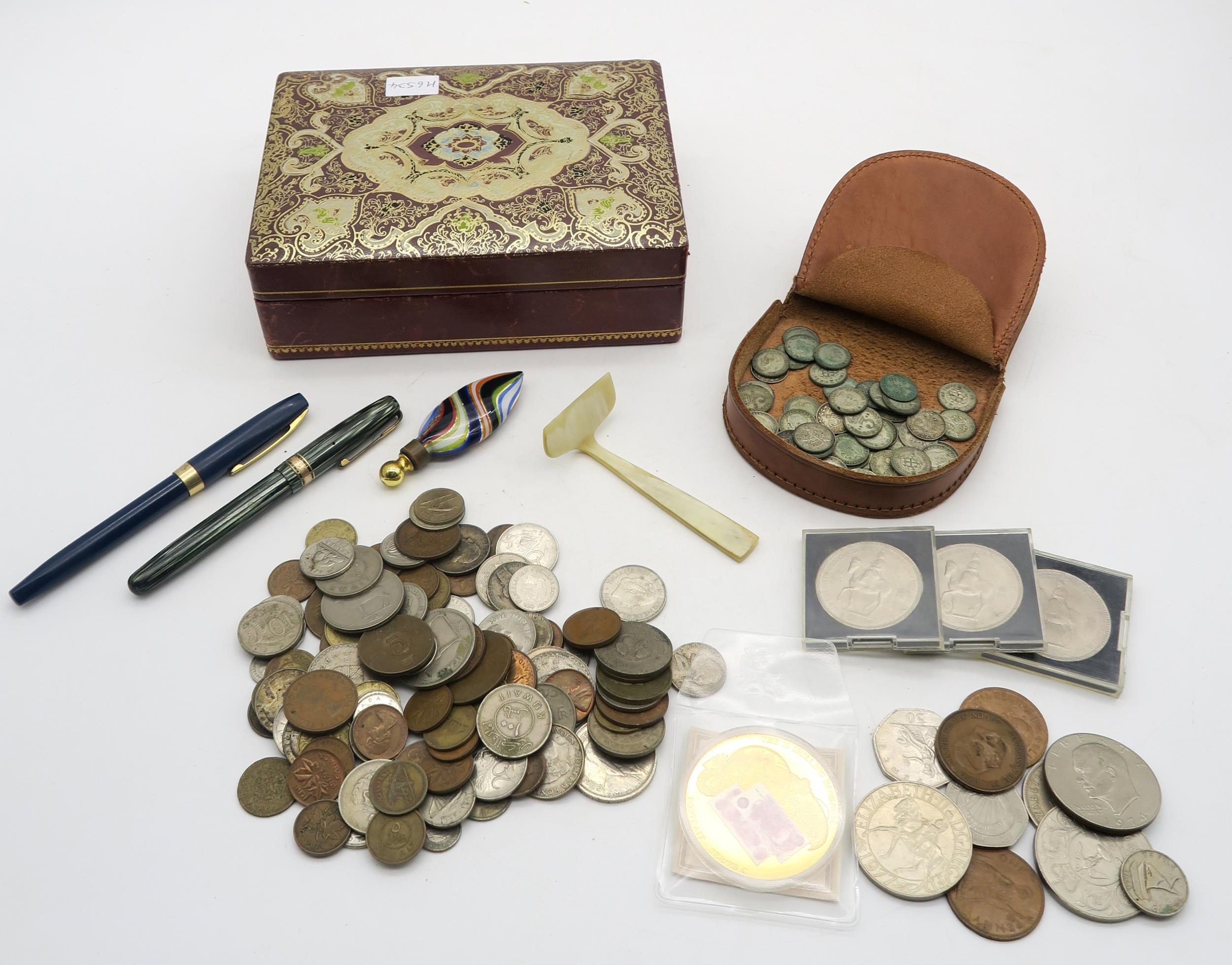 A mixed lot, comprising a selection of British pre-decimal and commemorative coins, international