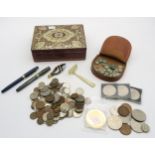 A mixed lot, comprising a selection of British pre-decimal and commemorative coins, international