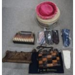A Copland and Lye hat box, three Missoni ties, a J & M Davidson leather bag and three snake skin