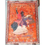 An Iranian rust ground pictographic rug depicting a man and woman dancing with blue geometric border