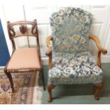 A 20th century mahogany framed Georgian style open armchair with tapestry upholstery and a