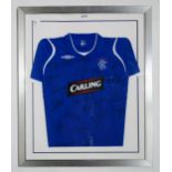 SPORTING MEMORABILIA A framed Glasgow Rangers 2008-09 home football shirt, with team signatures