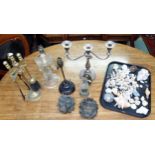 A mixed lot to include carved oak lions heads, silver plated three branch candelabrum, brass fire