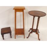 A 20th century mahogany circular topped occasional table with barley twist uprights on quadrupedal