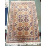 A cream ground Bokhara rug with all over lozenge design and multicoloured borders Condition Report: