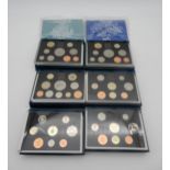 ROYAL MINT proof coin sets with examples through the 1990's together with 1979 and 1982 Condition