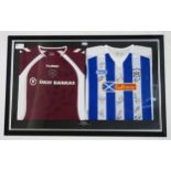 SPORTING MEMORABILIA  A framed pair of football shirts, with plaque engraved " Presented to Millar &