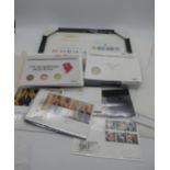 *WITHDRAWN* A lot comprising Queen Elizabeth II commemorative coins, stamps including a framed