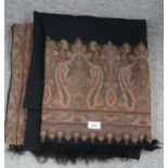 A large black ground paisley shawl with 305cm x 158cm Condition Report:Not available for this lot.